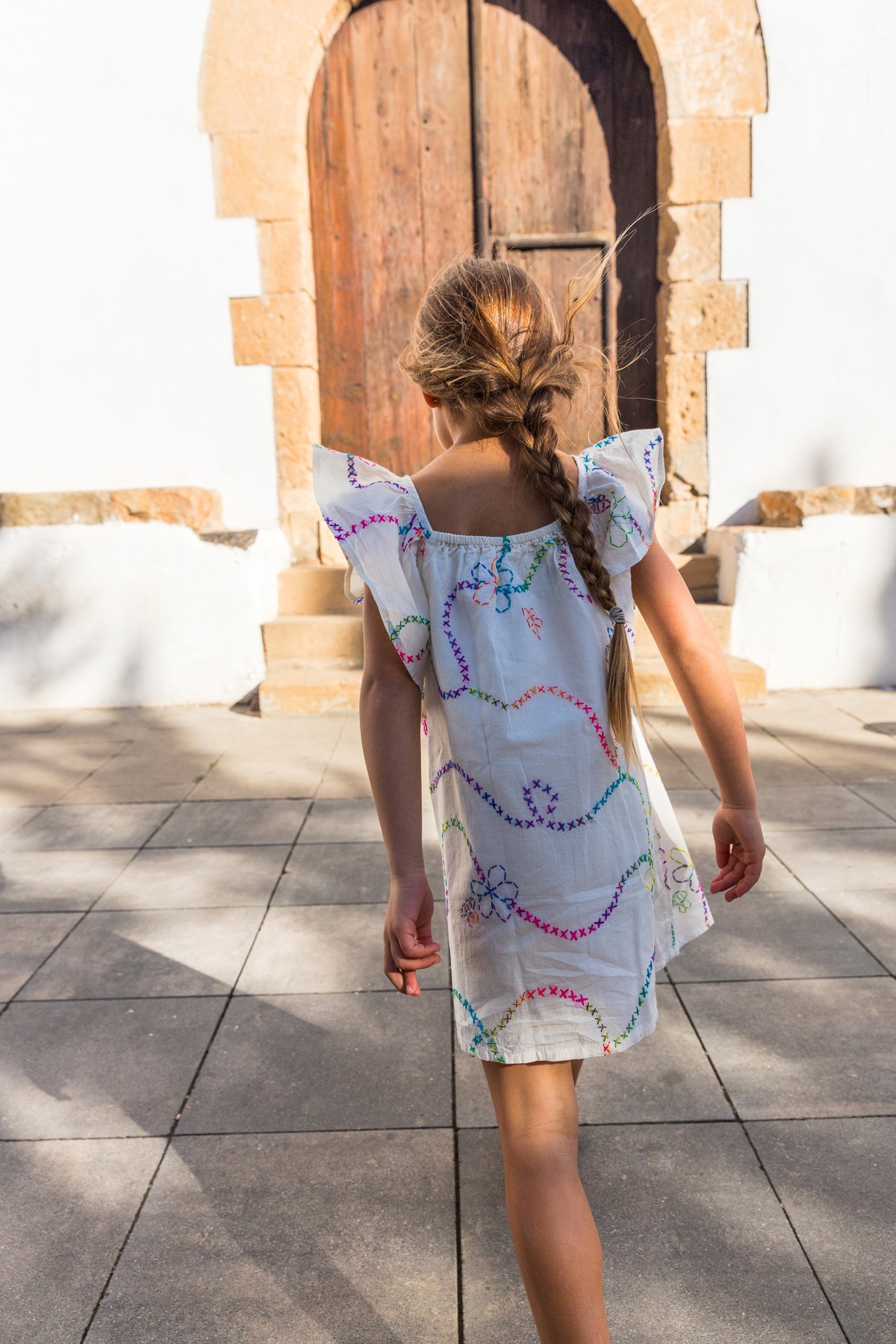 Hand embroidered in Spain