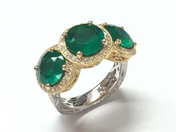 Natural emerald and diamond ring