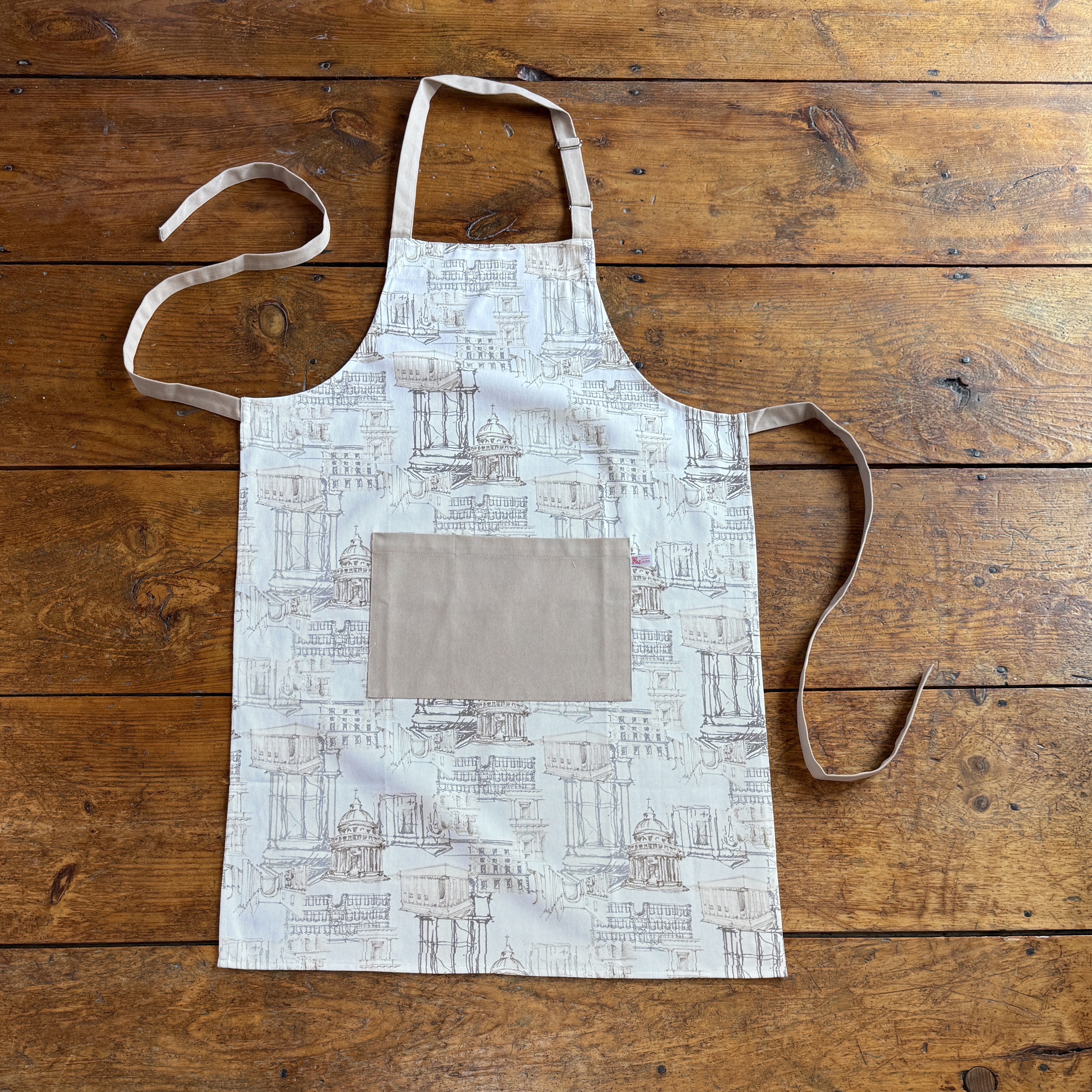 Original Hand Painted Art,  Printed on 100% Cotton Twill ,  With Adjustable Neck Strap and generous pockets. 