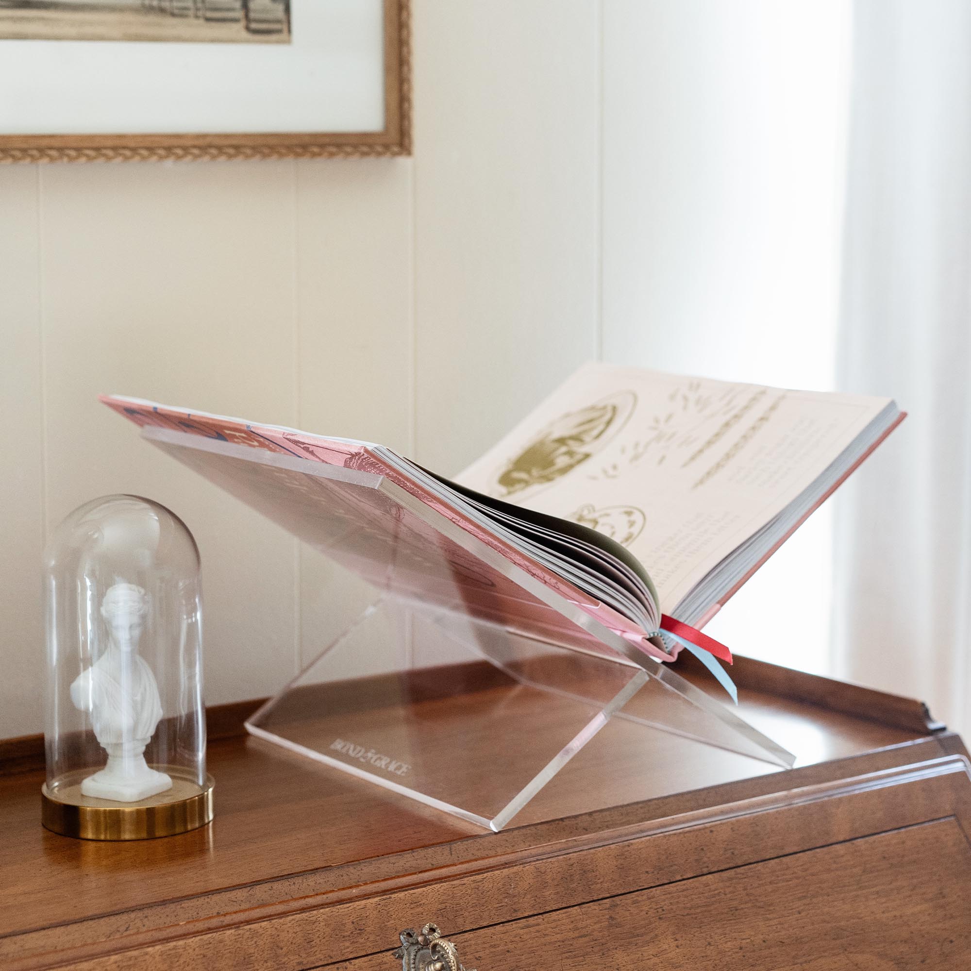 Display your love of art and literature with an acrylic book stand, custom-fit to cradle the Art Novel. 