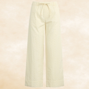Crafted in lightweight eyelet fabric, these wide-leg pants feature an elastic waistband with a drawstring tie for a comfortable, customizable fit.