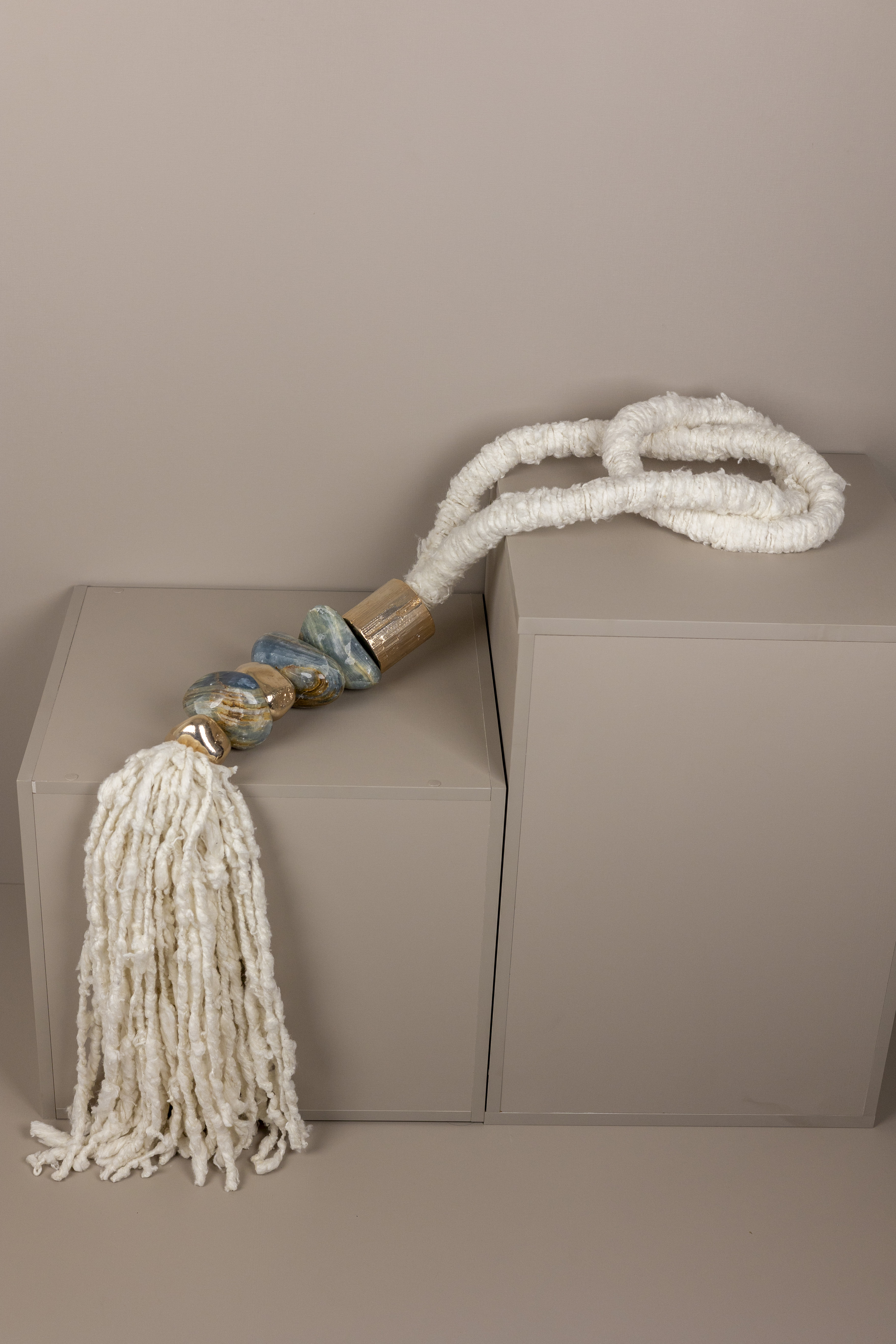 Timeless necklaces, in natural fiber, with organic shapes and handcrafted execution, with semi-precious natural stones.