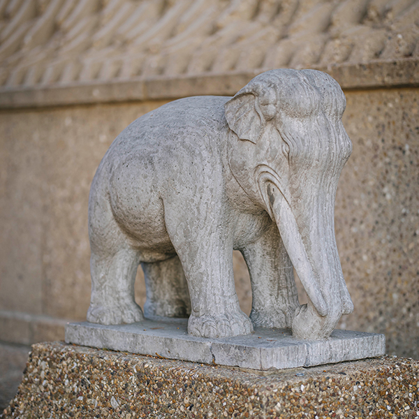 PAIR OF ANTIQUE STONE ELEPHANTS