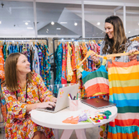Apparel & Accessories exhibitor staff working during market